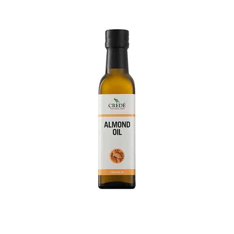 Crede Almond Oil bottle, a rich source of Vitamin E and oleic acid, perfect for cosmetics and cooking.