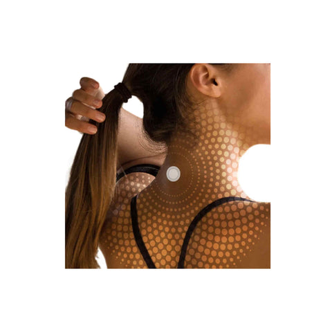 Woman applying LifeWave X39 patch for phototherapy on her neck to boost energy and enhance healing.