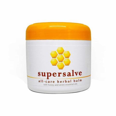Supersalve All Care Balm in a jar with honeycomb design, featuring therapeutic herbal oils for skin relief.